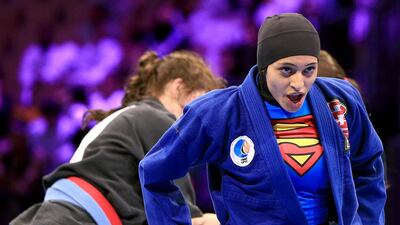Reem Rashid Al Falahi wins her bout on Monday in the 61.5 kilogram final at the Abu Dhabi Jiu-Jitsu Children's World Championship. Ravindranath K / The National