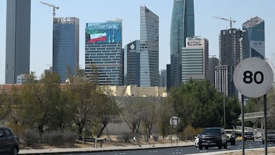 A large screen displays a verse from the Koran reading "My Lord, make this city secure," alongside the Kuwaiti flag and the landmark Kuwait Towers, on a skyscraper in Kuwait City on September 2, 2026. Iran launched a wave of attacks on US sites across the Middle East on September 2, as violence surged after an extensive American bombardment and the deaths of four people at an Iranian wedding party. Iran's Revolutionary Guards announced attacks on US bases in Jordan, the UAE, Kuwait, Bahrain and Iraq's autonomous Kurdistan region, in the six-month conflict's heaviest exchange in weeks. (Photo by AFP) /