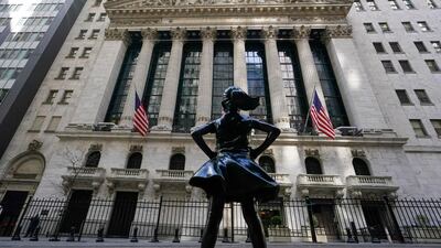 The Fearless Girl statue stands in front of the New York Stock Exchange in New York's Financial District last week. Stocks are off to a solid start on Wall Street as banks made up some of the ground they lost a day earlier. AP Photo