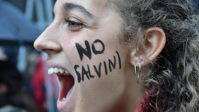 epaselect epa07581312 People take part with banners and flags in a anti-fascist demonstration in Milan, Italy, 18 May 2019. Demonstrators protest against a political rally of the Italian Interior Minister, Deputy Premier and Secretary of Italian party 'Lega' (League), Matteo Salvini, held in the Duomo square of Milan with other populist parties, some from the far-right, including France's National Rally and Alternative for Germany. EPA/Daniel Dal Zennaro