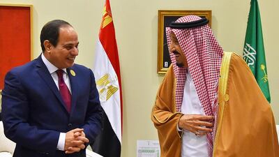 President Abdel Fattah El Sisi with Saudi Arabia's King Salman at the Arab League summit in the Jordanian Dead Sea resort of Sweimeh on March 29, 2017. Mr El Sisi will meet with Donald Trump on Monday. AFP PHOTO / EGYPTIAN PRESIDENCY
