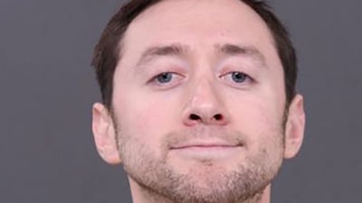 Justin Mohn, a suspect in his father's murder, poses in a booking photograph at Bucks County Correctional Facility in Doylestown, Pennsylvania. Bucks County District Attorney's Office / Reuters