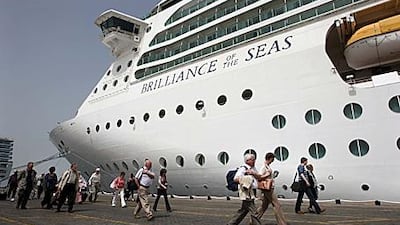 Passengers board Brilliance of the Seas at Port Rashid. The cruise liner sails from Dubai to Muscat, Fujairah, Abu Dhabi, Bahrain and returns to her starting point a week later.
