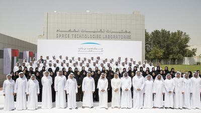 Sheikh Mohammed bin Zayed and Sheikh Mohammed bin Rashid at the Mohammed bin Rashid Space Centre. With them are Mohammed Mubarak Al Mazrouei, Undersecretary of the Crown Prince Court of Abu Dhabi, right, Dr Khalifa Mohamed Al Romaithi, Chairman of the UAE Space Agency, fifth right, Jassem Mohamed Bu Ataba Al Zaabi, Chairman of the Executive Committee Office, sixth right, Khaldoon Khalifa Al Mubarak, Chief Executive and Managing Director, Mubadala and Chairman of the Abu Dhabi Executive Affairs Authority, seventh right, Mohamed Ahmad Al Bowardi, Minister of State for Defence Affairs, eighth right, Sheikh Mansour bin Zayed, Deputy Prime Minister and Minister of Presidential Affairs, ninth right, Sheikh Hamdan bin Mohammed, Crown Prince of Dubai, 12th right, and Mohamed Abdulla Al Gergawi, Minister of Cabinet Affairs and the Future, 13th right. Mohamed Al Hammadi / Crown Prince Court - Abu Dhabi