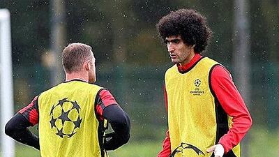 Much of Manchester United time was spent in ensuring Wayne Rooney, left, stays while Marouane Fellaini was the only player they managed to sign. Alex Livesey / Getty Images