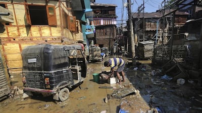 Floods engulfed much of Kashmir two weeks ago, leaving thousands of people homeless in both the Indian and Pakistani administered areas. Dar Yasin / AP Photo