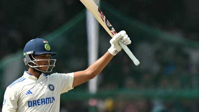 India's Yashasvi Jaiswal celebrates after reaching his fifty at the Green Park Stadium in Kanpur. AFP
