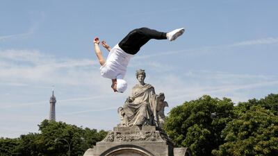 A member of the public takes part in sporting events at Place de la Concorde, which has been turned into a giant Olympic park ahead of the Paris 2024 Olympics, in Paris, France. Reuters
