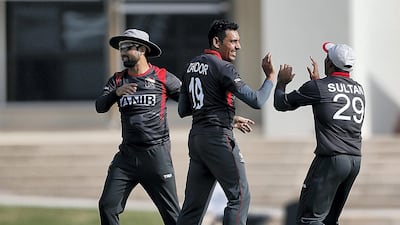 UAE team players celebrate after beating USA by 24 runs in the second T20 international in Dubai to seal the two-match series 1-0.