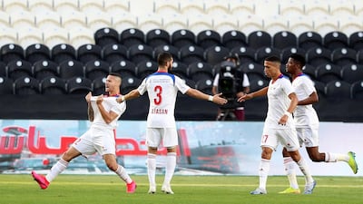 Sharjah's Marcus Vinicius celebrates his goal against Al Ain. Chris Whiteoak / The National