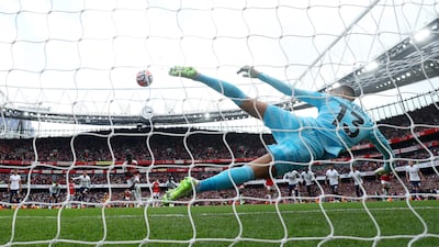 Bukayo Saka of Arsenal scores the team's second goal past Guglielmo Vicario of Tottenham. Getty