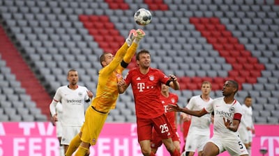 Bayern Munich's Thomas Muller in action with Eintracht Frankfurt's Kevin Trapp. AP