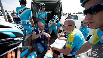 Members of team Astana prior to the second stage of the Dubai Tour cycling race.