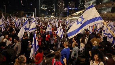 Protesters gather after Israeli Prime Minister Benjamin Netanyahu dismissed Defence Minister Yoav Gallant. Reuters