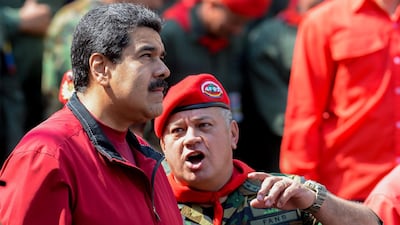 (FILES) In this file photo taken Venezuelan President Nicolas Maduro and Diosdado Cabello, president of the Venezuelan Constituent Assembly, attend a ceremony on February 04, 2016 to commemorate the 24th anniversary of former president Hugo Chavez's military coup against the government of Carlos Andres Perez. Federico Parra / AFP PARRA