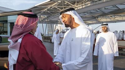 Sheikh Mohamed bin Zayed greets King Hamad. Mohamed Al Hammadi / Ministry of Presidential Affairs