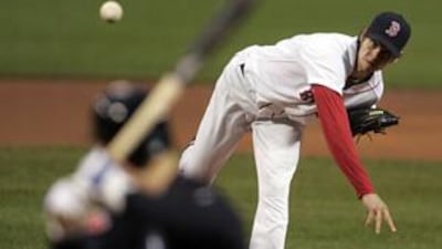 Clay Buchholz of the Boston Red Sox pitches to the Toronto Blue Jays in the first inning of their American League game at Fenway Park in Boston.