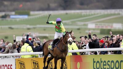 Kauto Star wins the Cheltenham Gold Cup Steeple Chase during the fourth day of the Cheltenham Festival on March 13, 2009. AFP PHOTO / Adrian Dennis