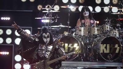 Gene Simmons, left, and Eric Singer of the band Kiss perform during the Fashion Rocks 2014 concert in the Brooklyn borough of New York on September 9, 2014. Carlo Allegri / Reuters
