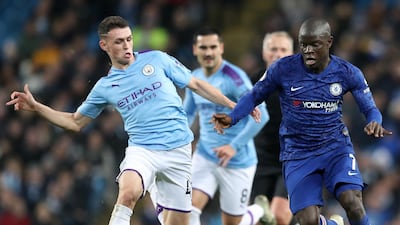 Chelsea's N'Golo Kante (R) in action against Manchester City's Phil Foden. EPA