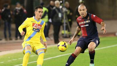 Jose Callejon, left, of Napoli and Radja Nainggolan, right, vie for the ball on Saturday. AFP Photo