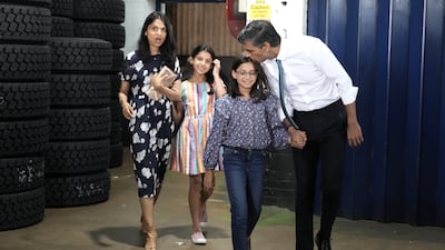 With daughters Krisna and Anoushka and wife Akshata Murthy in July 2022. Getty Images