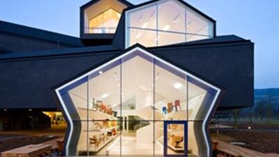 VitraHaus is an interactive furniture shop showcasing the Vitra Home Collection, with re-editions of design classics.