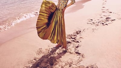 COASTAL NOSTALGIA: Cardigan, Dh3,725, M Missoni; Skirt, Dh5,600, Gucci; Scarf, Dh1,720, Hermes; Shoes, Dh2,690, Christian Louboutin; Sunglasses, Dh1,650, The Row at Boutique 1