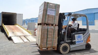 Humanitarian aid from the UNHCR stockpile in Dubai is loaded aboard containers to help displaced South Sudanese. Courtesy of UNHCR