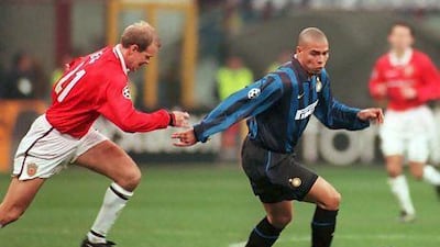 Inter Milan’s Ronaldo shows off his skills as he gets away from Manchester United’s Henning Berg in the Champions League in 1999.