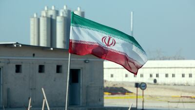 An Iranian flag flies outside Iran's Bushehr nuclear power plant. AFP