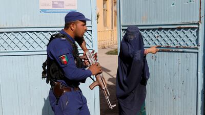 An Afghan woman arrives at a polling station to cast her vote during parliamentary elections in Kabul, Afghanistan. Reuters