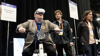 A man tries out a snow bike made by Moonbike Motors. Bloomberg