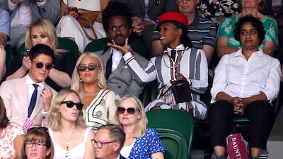 Janelle Monae (centre middle) on day one of the Wimbledon Championships at the All England Lawn Tennis and Croquet Club. PA