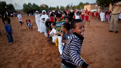 Led by 9-year-old Fahad Hamed (R), children rope pulling on Family Day at Dar Zayed for Family Care, a state-funded programme in Al Ain for abandoned, orphaned or neglected children. Silvia Razgova / The National
