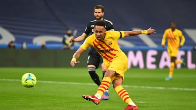 Pierre-Emerick Aubameyang has a shot on goal against Real Madrid. Getty Images
