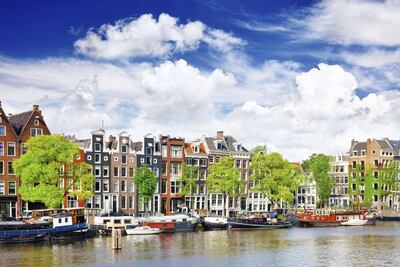 Amsterdam's picturesque canals cannot hide the fact that the Dutch capital is the most expensive of the 10 most popular European cities for UAE travellers, according to Skyscanner. Getty Images