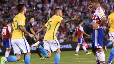 Brazil's Dani Alves celebrates after scoring against Paraguay in World Cup qualifying on Tuesday night. Pablo-Burgos / AFP / March 29, 2016