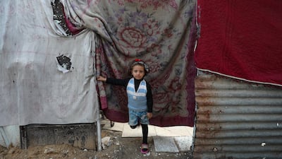 Four-year-old Palestinian girl Jori Abed Al All poses outside her family's shelter in Sheikh Radwan neighborhood of Gaza City, amid a ceasefire between Israel and Hamas. Around 1.9 million people in Gaza, nearly 90 percent of the population, have been displaced since the Israel-Hamas conflict began in October 2023, according to the UN. EPA