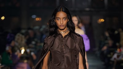 A chocolate caped look from the Valentino spring/summer 2022 show