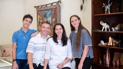 Brandon Rowberry with his wife Kimberly and children Sawyer and Alis at home in Al Barsha, Dubai. All photos: Ruel Pableo / The National