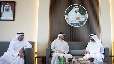 Sheikh Mohamed bin Zayed, Crown Prince of Abu Dhabi and Deputy Supreme Commander of the Armed Forces (C), visits the home of Dr Omar Habtoor Al Derei, Director General of the UAE Fatwa Council (R). Seen with Hamad Habtoor Al Derei (L).
