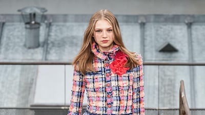 Intricate tweed and a giant flower brooch at Chanel spring summer 2020