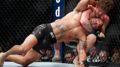 Ben Askren chokes Robbie Lawler in their welterweight mixed martial arts bout at UFC 235. AP Photo