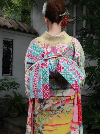 Palestine kimono and obi on a model. Kimono Project