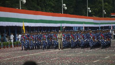 Kolkata police officers from the Rapid Action Force squad members march at Independence Day celebrations along Red Road in Kolkata. EPA