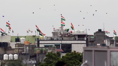 People fly kites to mark India's Independence Day. AFP