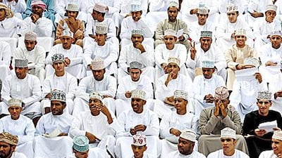 Thousands of unemployed Omanis gather at the national football stadium in Muscat in March 2011 in the hope of clinching one of the 10,000 vacancies for new police recruits.
