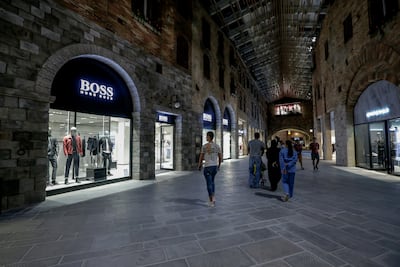 The mall offers more than 100 labels, combining luxury fashion houses, sportswear and lifestyle. Victor Besa / The National