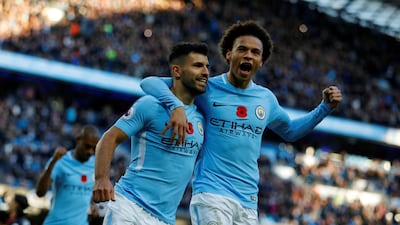 Manchester City's Sergio Aguero, left, had a memorable time on and off the pitch on Sunday. Phil Noble / Reuters